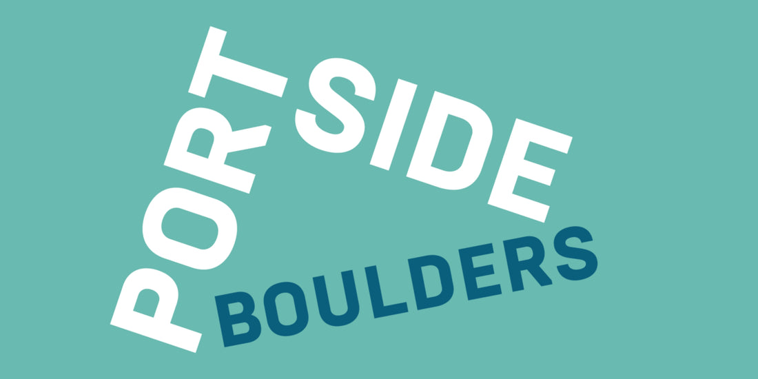 Logo of Portside Boulders featuring stylised mountain peak shaped text 'Portside Boulders' in bold, modern typography, with light blue background, indicating a premier rock climbing and bouldering gym.